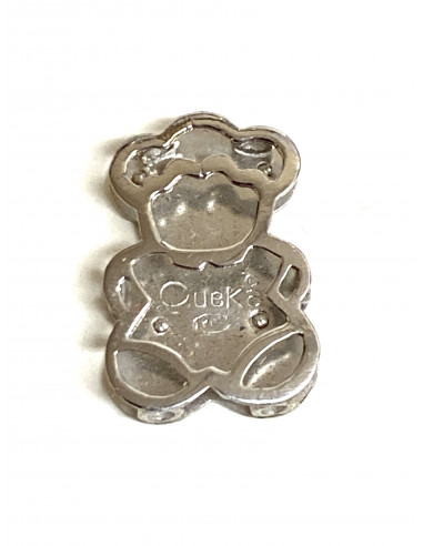 Colgante Muñeco en oro blanco de 18 kilates