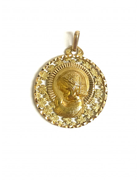 Virgen en oro de 18 kilates.